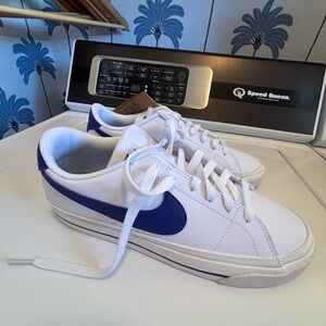 Nike women’s White and Navy Sneakers